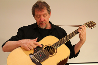 Illustration for article titled How Inventor Paul Vo Created a Little Black Box That Could Change Guitars Forever